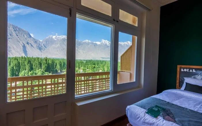 Mountain view hotel room in Skardu with Karakoram peaks — North Ka Safar premium booking